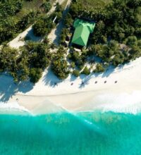 aerial-shot-maldives-showing-amazing-beach-clear-blue-sea-jungles_181624-3948